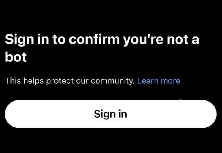 Screen shows the error 'sign in to confirm you're not a bot' triggered in an account